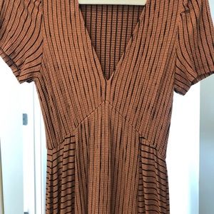 V-Neck Maxi Dress. Pumpkin-y brown with black horizontal and vertical stripes